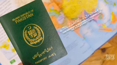 An illustration surrounds a file photo of a Pakistani passport.