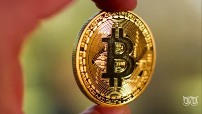 A file photo shows a physical Bitcoin token.