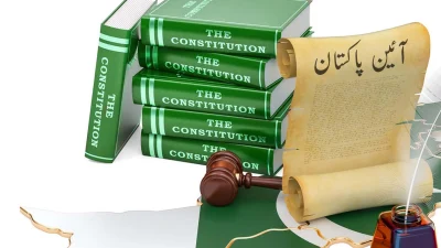 An illustration shows a series of books labelled 'The Constitution'. — FILE/THE THURSDAY TIMES