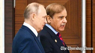 A file photo is shown of Russian premier Vladimir Putin (L) and Pakistani prime minister Shehbaz Sharif (R) at Astana in October 2022. — FILE/KREMLIN