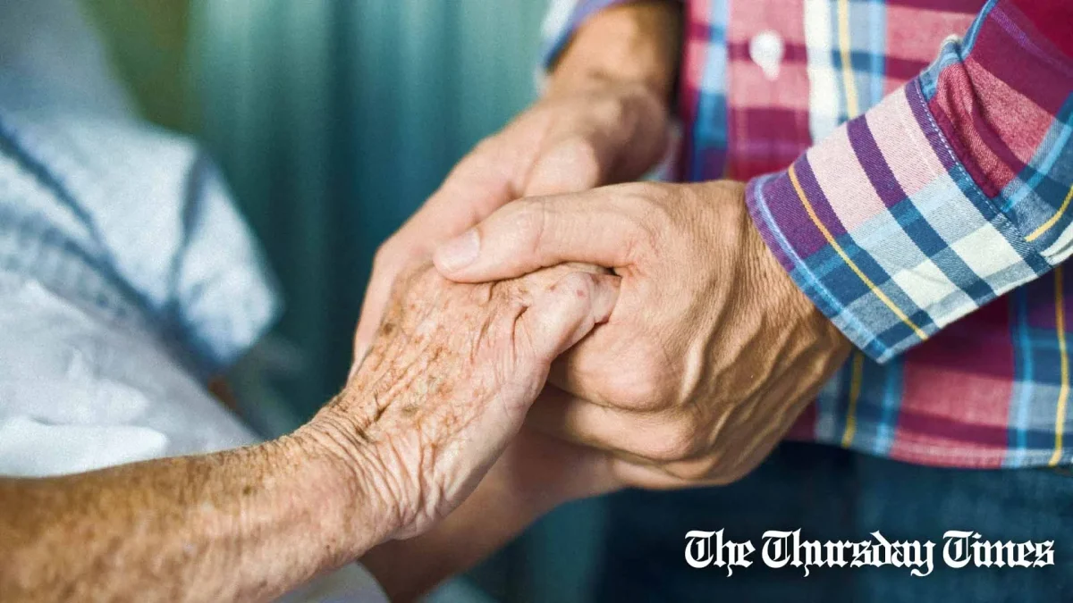 A duo hold hands. — FILE/THE THURSDAY TIMES