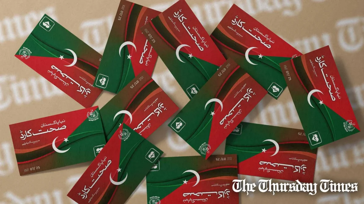 A file photo is shown of strewn PTI-era health cards. — FILE/THE THURSDAY TIMES