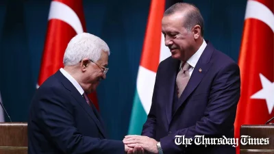 A file photo is shown of Palestinian president Mahmoud Abbas (L) with Turkish president Recep Tayyip Erdoğan (R). — FILE/THE THURSDAY TIMES