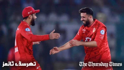 Islamabad United's Imad Wasim (R) and Shadab Khan (L) celebrate after dismissing Multan Sultans' Chris Jordan during the PSL 9 finale at Karachi on March 18, 2024. — AFP