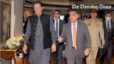 A file photo is shown of former prime minister Imran Khan with former DG ISI Faiz Hameed. — FILE/THE THURSDAY TIMES