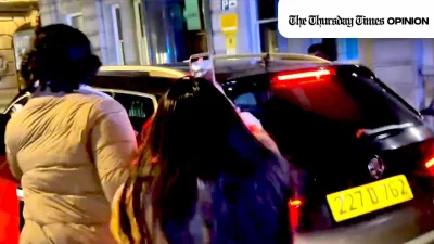 A file photo is shown of PTI London members obstructing the retired Chief Justice of Pakistan, Qazi Faez Isa's, escort vehicle. — X/@SHAYANA2307