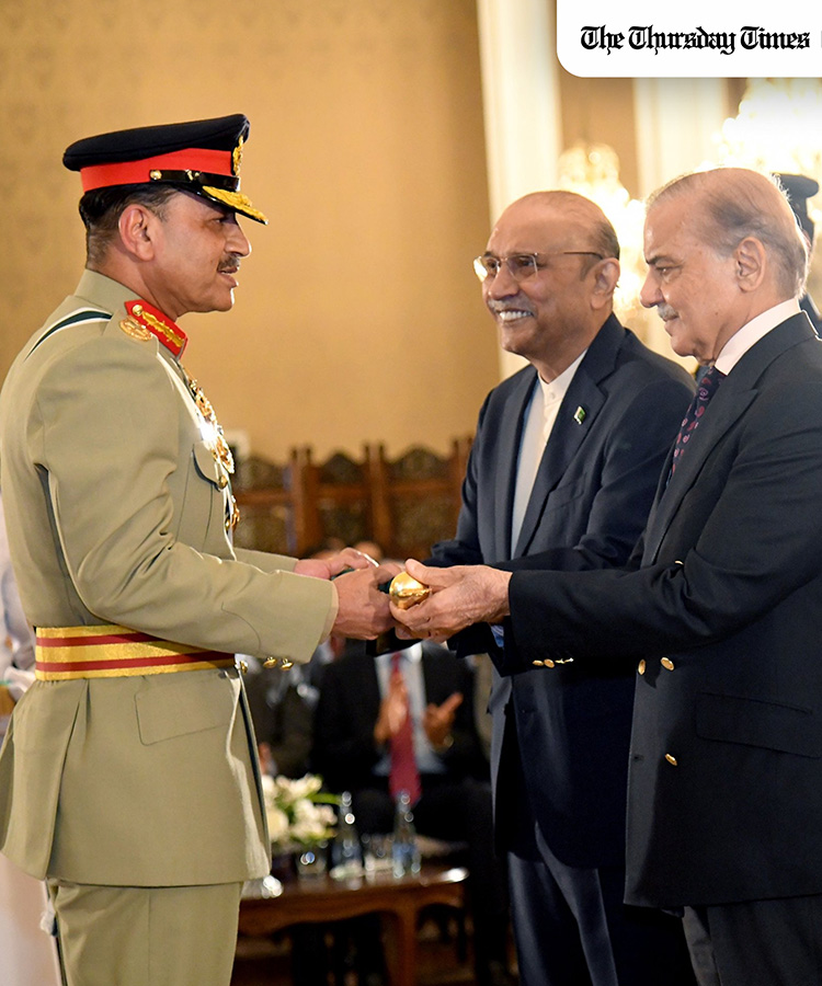 Chief of Army Staff General Asim Munir receives the baton of Field Marshal from Prime Minister Shehbaz Sharif and President Asif Ali Zardari.