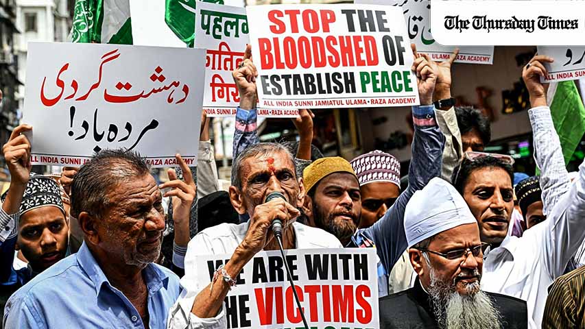 A Hindu resident speaks as he joins Muslim demonstrators during a protest to condemn the terror attack in Pahalgam, in Mumbai on April 25, 2025. At least 26 people were killed April 22 in Indian-administered Kashmir when gunmen opened fire on tourists, security sources told AFP, in the insurgency-hit region's deadliest attack on civilians since 2000. (Photo by Indranil MUKHERJEE / AFP)