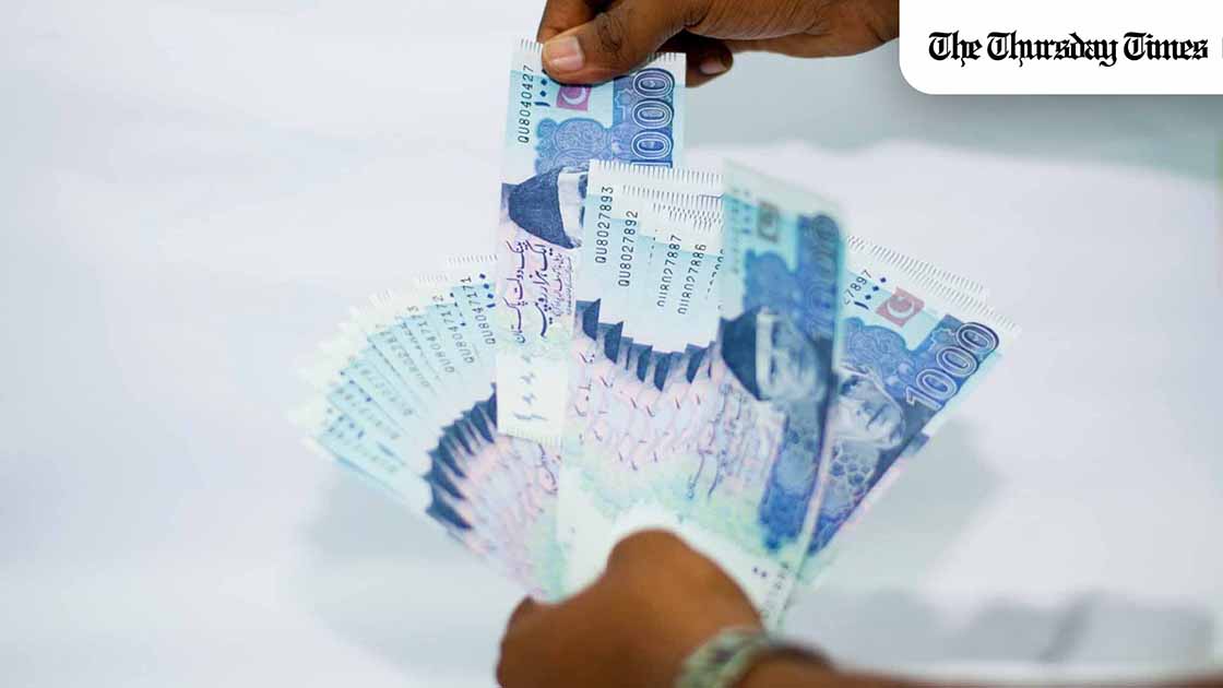 A file photo is shown of Pakistani Rupee banknotes. — FILE A file photo is shown of Pakistani Rupee banknotes. — FILE