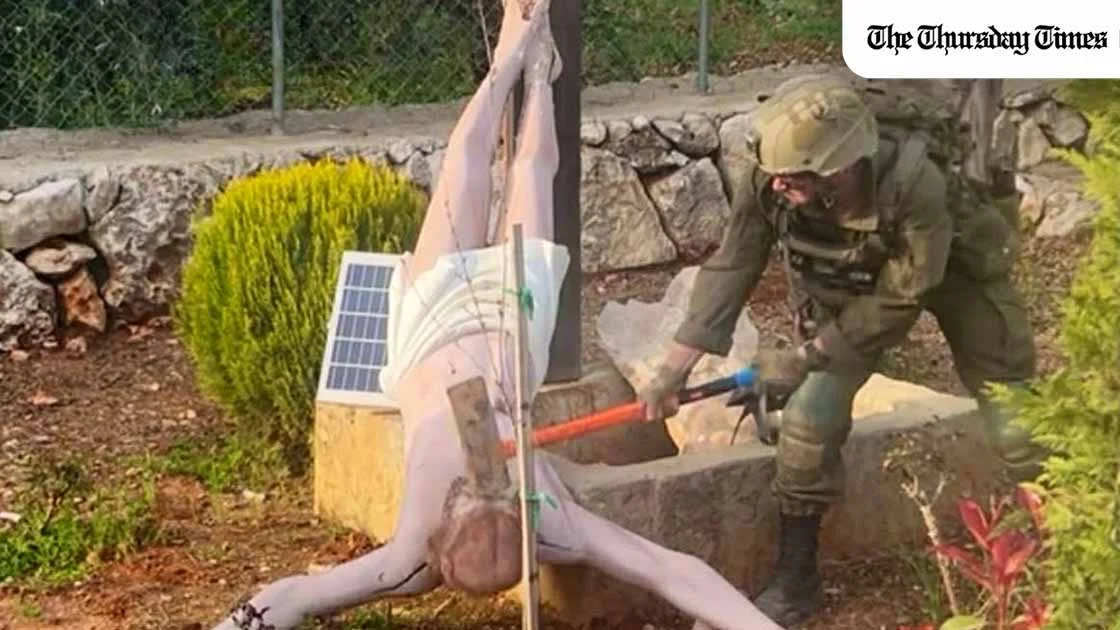 The IDF says it is investigating a viral photograph showing a soldier damaging a statue of Jesus Christ in southern Lebanon, calling the conduct inconsistent with military values. — FILE