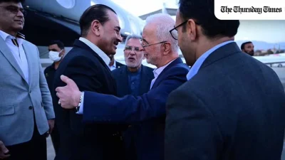 Pakistan's Field Marshal Asim Munir is greeted by Iranian officials on arrival at Tehran airport on 22 May 2026 as Pakistan leads mediation efforts in US-Iran peace negotiations. FILE