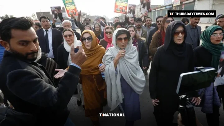 Imran Khan sisters walk with supporters near Adiala jail