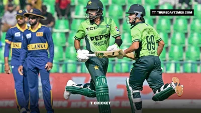 Babar Azam and a teammate run between the wickets against Sri Lanka