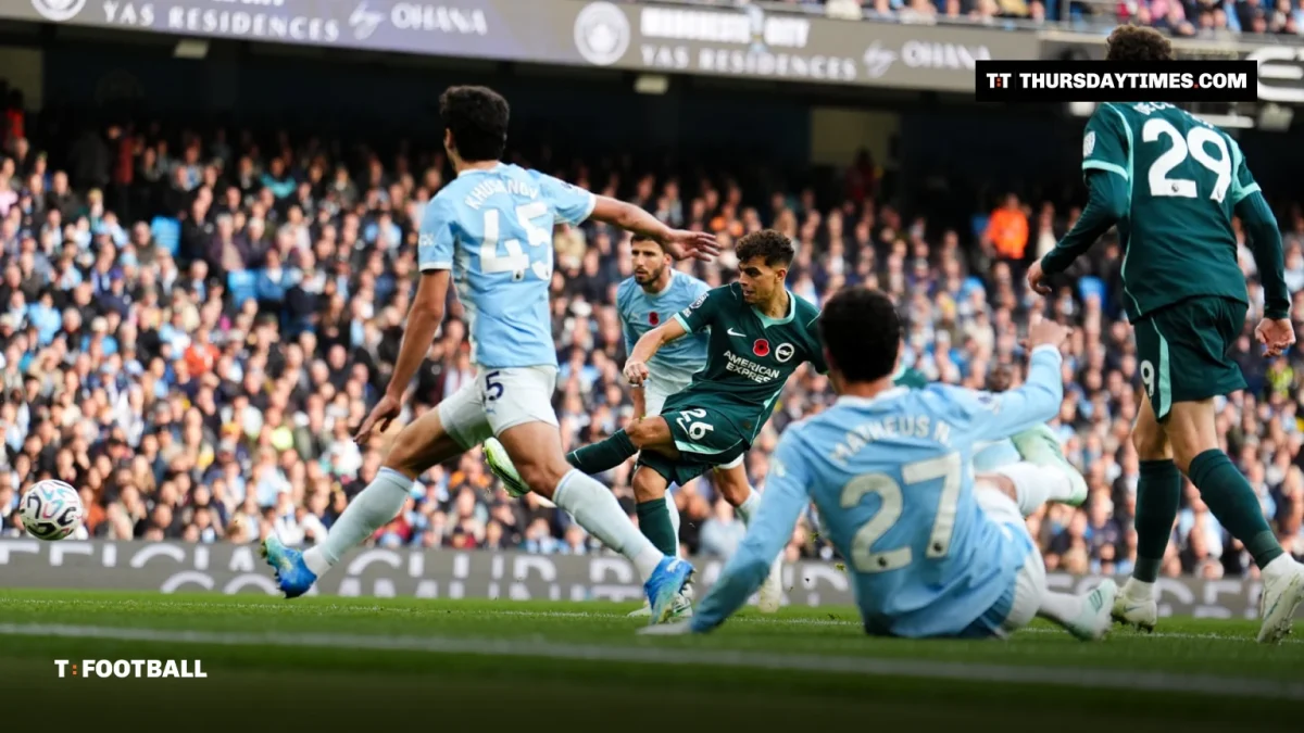 Yasin Ayari shoots past Manchester City defenders