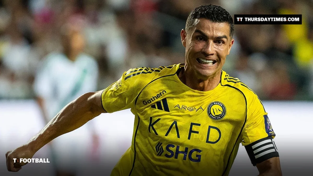 Cristiano Ronaldo in Al-Nassr yellow celebrating a goal