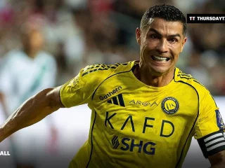 Cristiano Ronaldo in Al-Nassr yellow celebrating a goal