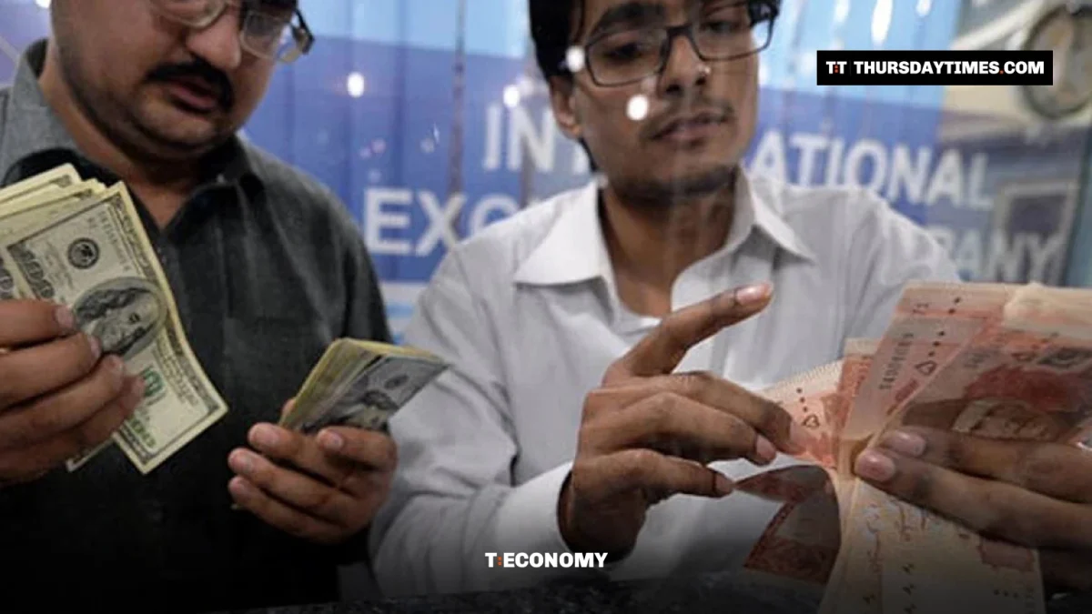 Men count dollars and rupees at an exchange counter in Islamabad