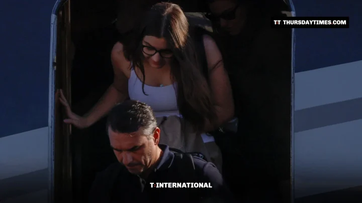 Flávio Bolsonaro steps down from a private jet doorway near Miami, followed by a young woman