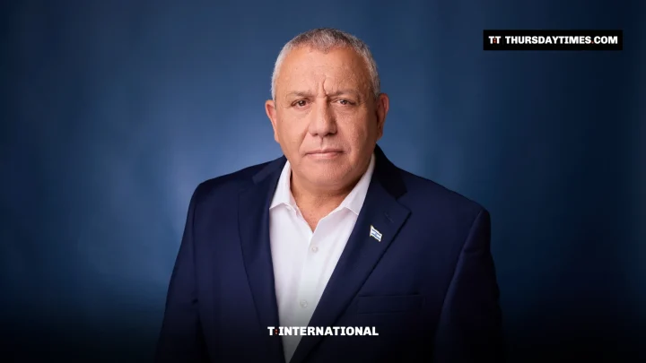 Portrait of Gadi Eisenkot in a dark suit against a blue background
