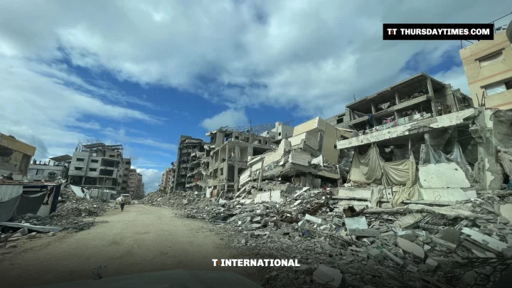 A street lined with collapsed and gutted buildings in Gaza City