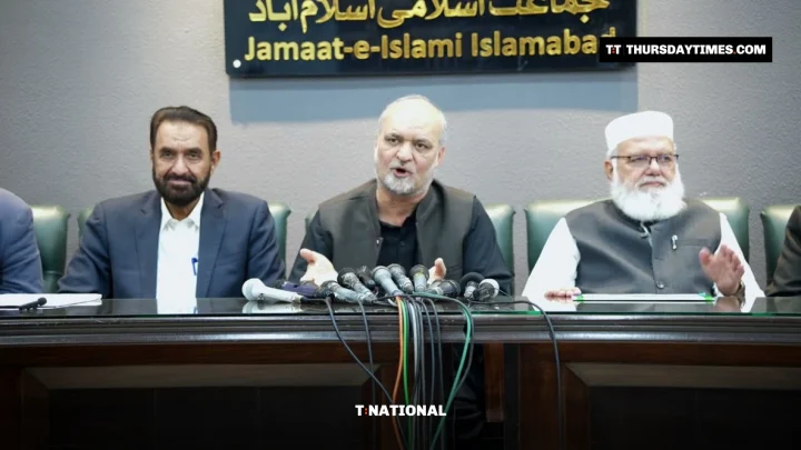 Hafiz Naeemur Rehman speaks into microphones at a Jamaat-e-Islami press conference in Islamabad