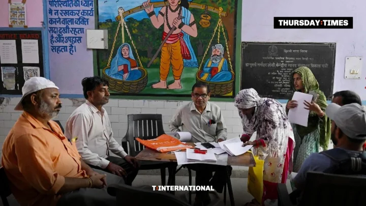 A booth-level officer helps residents with their documents at a voter verification camp in New Delhi, as India’s sweeping revision of its electoral rolls leaves millions racing to prove they can vote. — FILE/THE THURSDAY TIMES