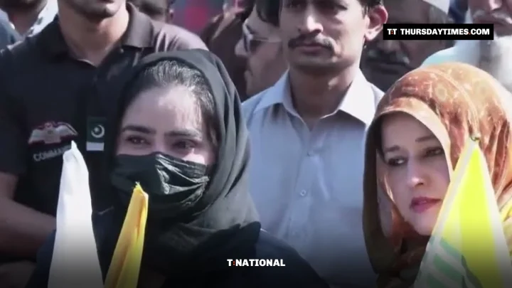 Participants carry Pakistani and Kashmiri flags at a Kashmir Black Day rally at D-Chowk in Islamabad on October 27, 2026. — SCREENGRAB VIA PTV NEWS
