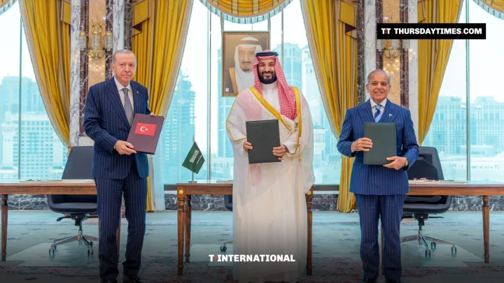 Erdogan, Mohammed bin Salman and Shehbaz Sharif hold signed copies of the Makkah defence agreement