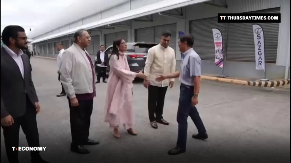 President Ferdinand Marcos Jr. shakes hands with guests outside the Sazgar plant in Laguna