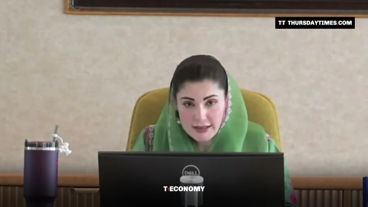Maryam Nawaz speaks at her desk to a delegation of farmers