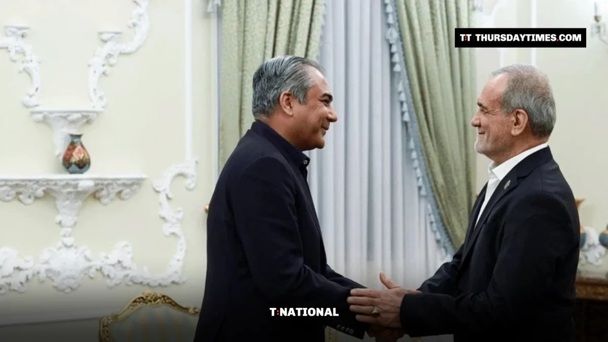 Mohsin Naqvi shakes hands with Masoud Pezeshkian in an ornate room in Tehran