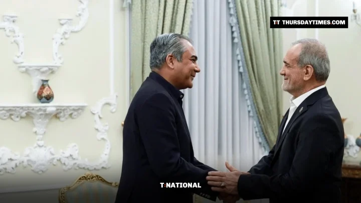 Mohsin Naqvi shakes hands with Masoud Pezeshkian in an ornate room in Tehran