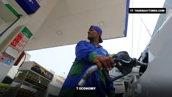 A worker refuels a vehicle at a petrol station in Peshawar, file photo. — FILE/THE THURSDAY TIMES