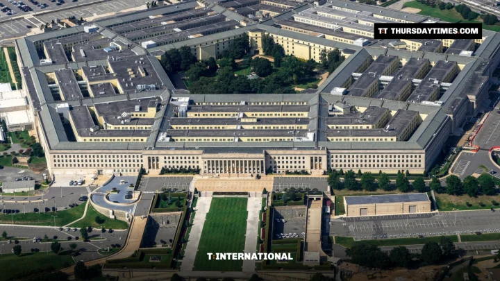 An aerial view of the five-sided Pentagon building and its car parks