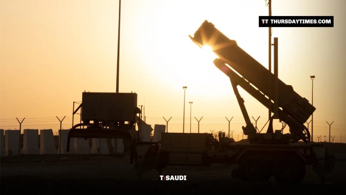 A Patriot missile launcher silhouetted against the setting sun