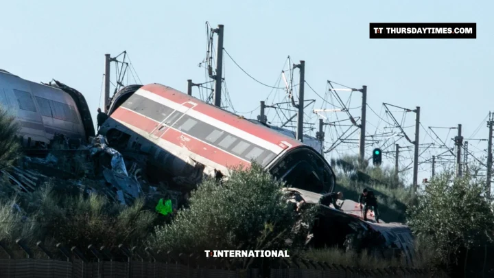 Derailed high-speed train carriages beside the track near Urda, Spain