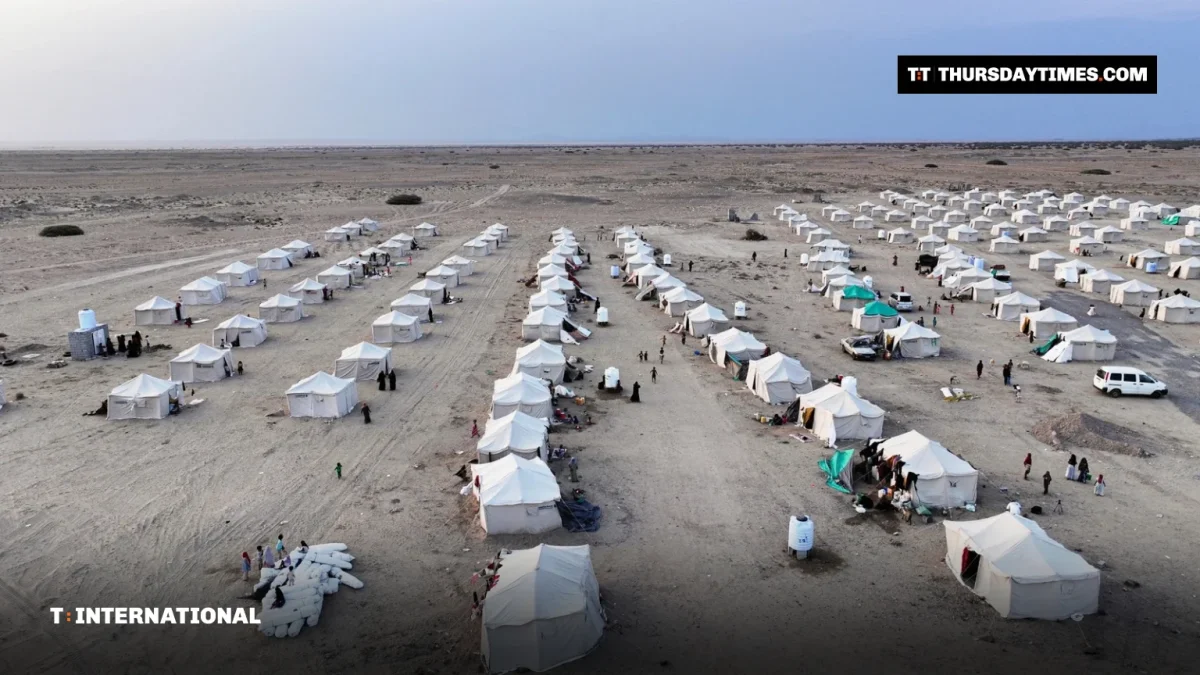 Rows of white tents at a camp for displaced families in Yemen