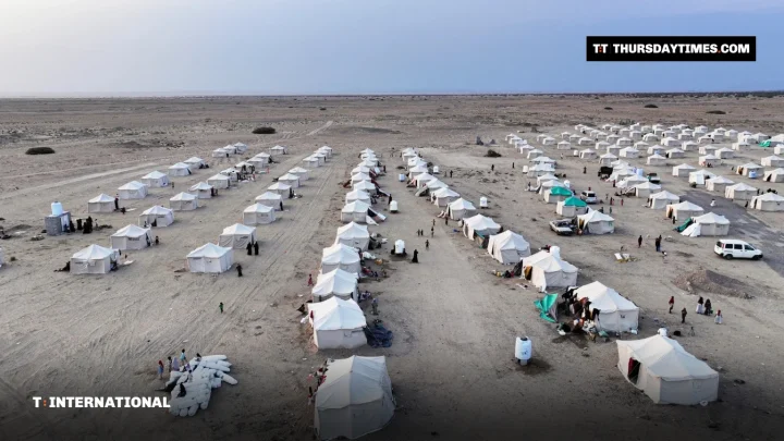 Rows of white tents at a camp for displaced families in Yemen